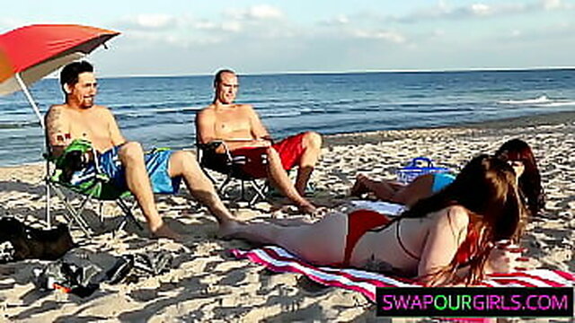 Stepdad and stepdaughter swap cocks on the beach