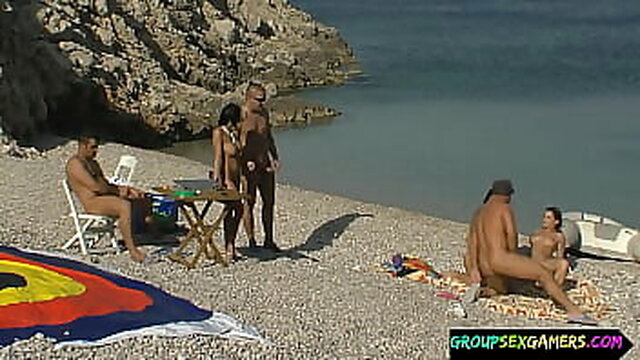 Amateur girls get naughty on the beach with dildos
