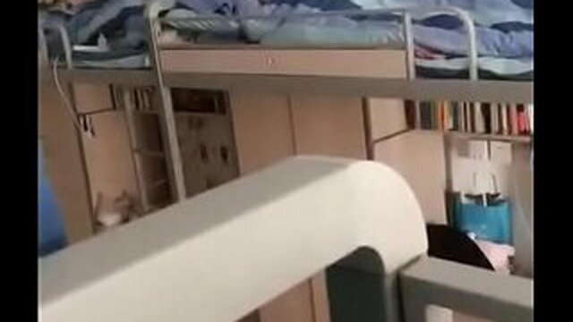 College student webcam in dorm room