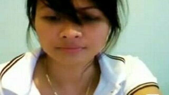 Young Asian girl shows her tits and pussy on the webcam