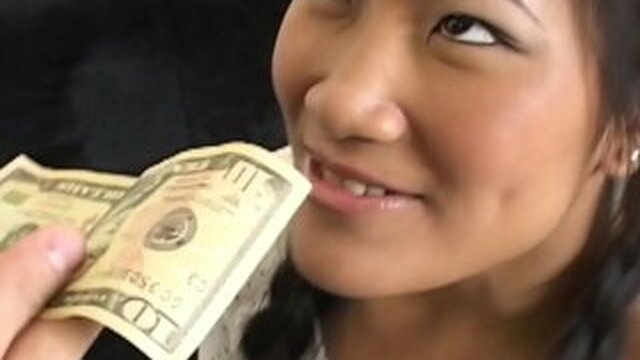 Miniature Asian girl sucks massive black cock and jumps on it for money