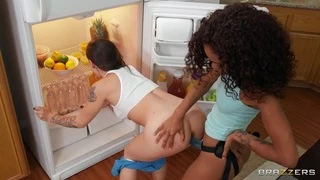 Aubrees sexy roomie fucks her with a strap-on in the kitchen.